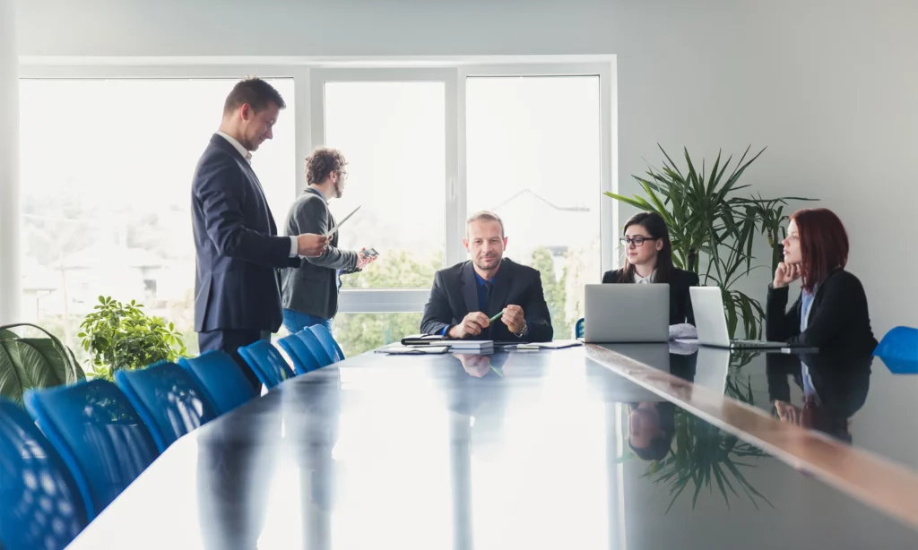 LPO benefits australian legal market a team of outousrced paralegals and document specialist are having a brainstorming