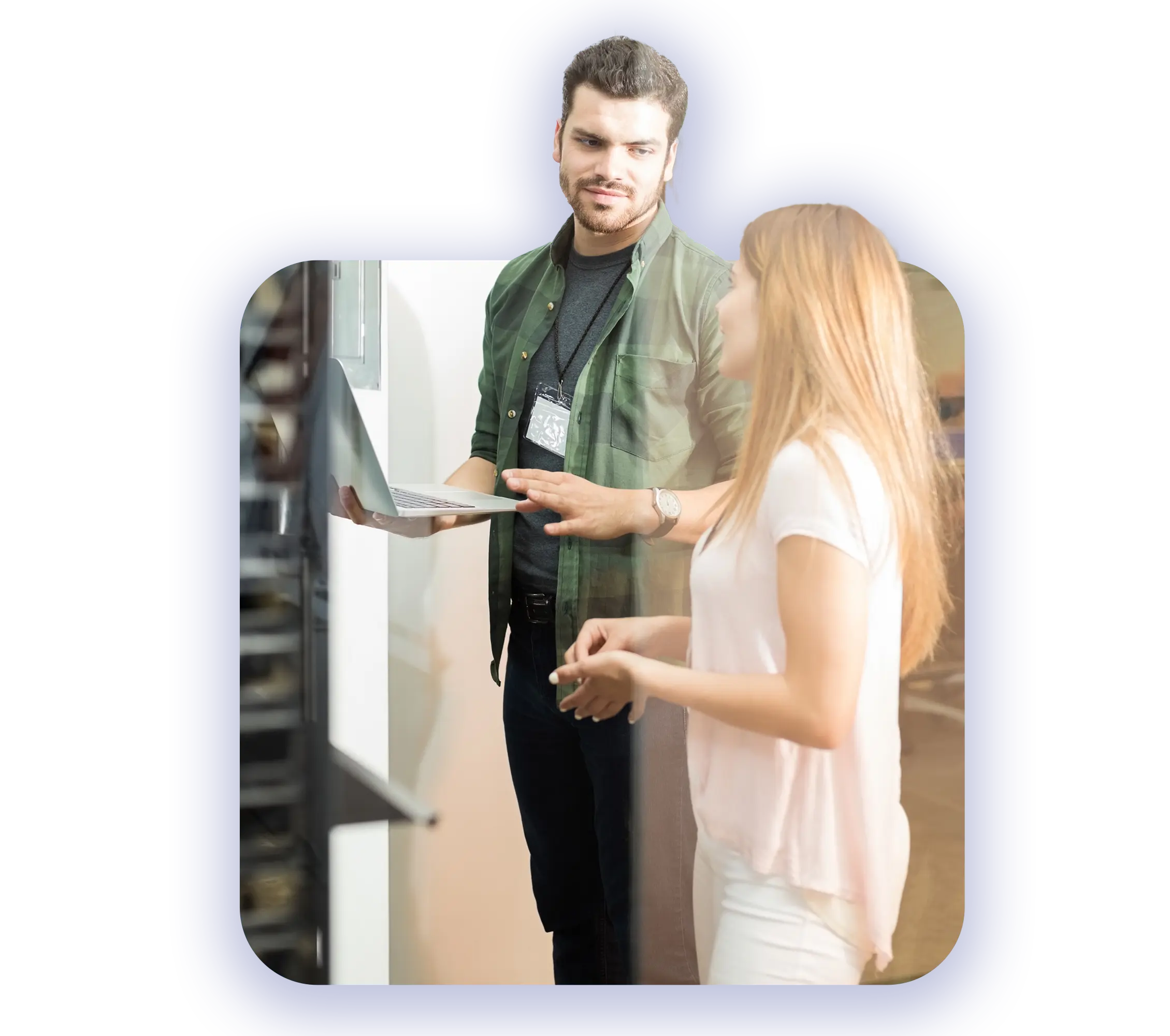 Outsourced IT Solutions a male and female IT infrastructure checking servers for possible service disruptions