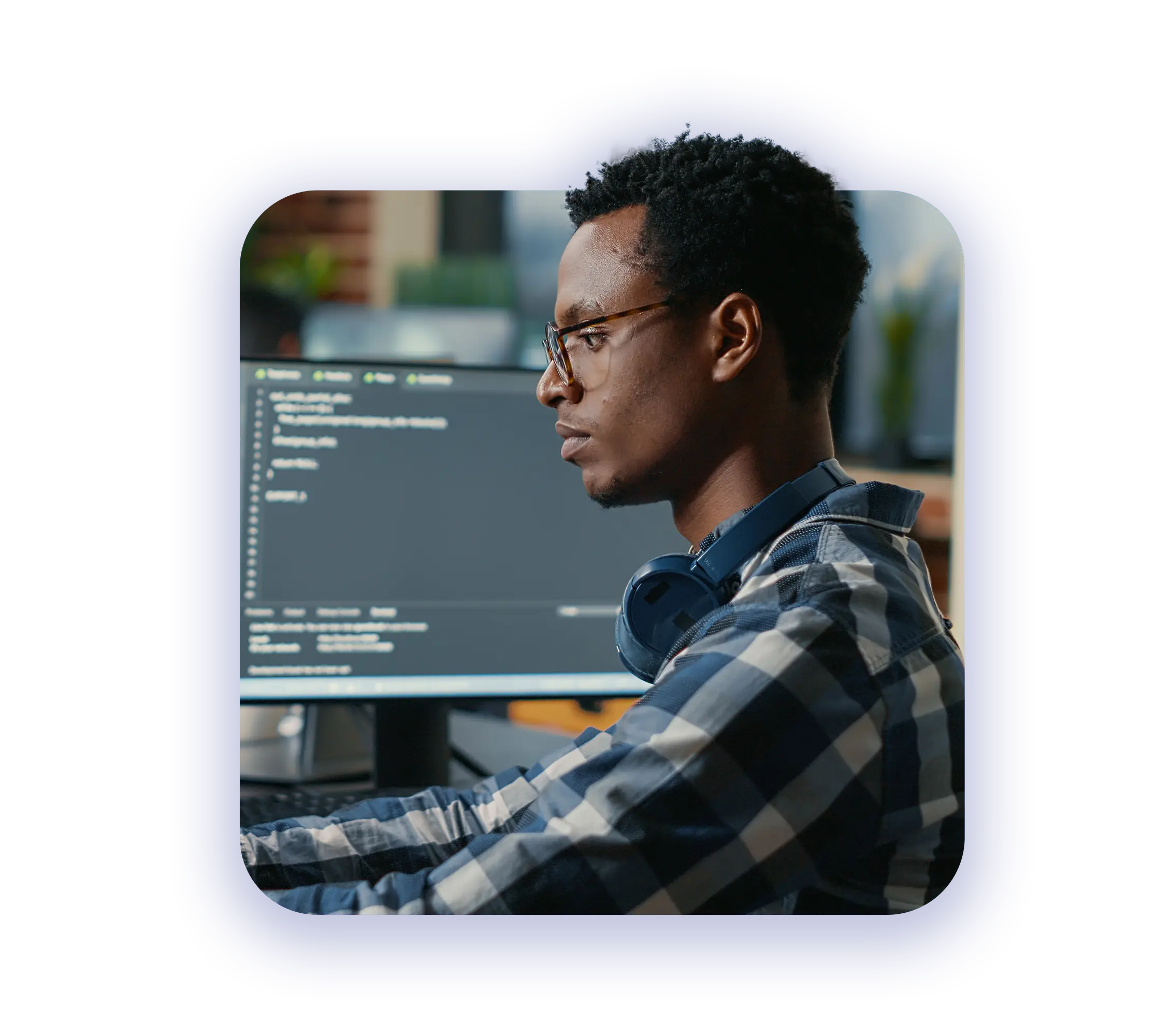 Outsourced IT Solutions a male cybersecurity engineer proactively monitoring systems for possible threats