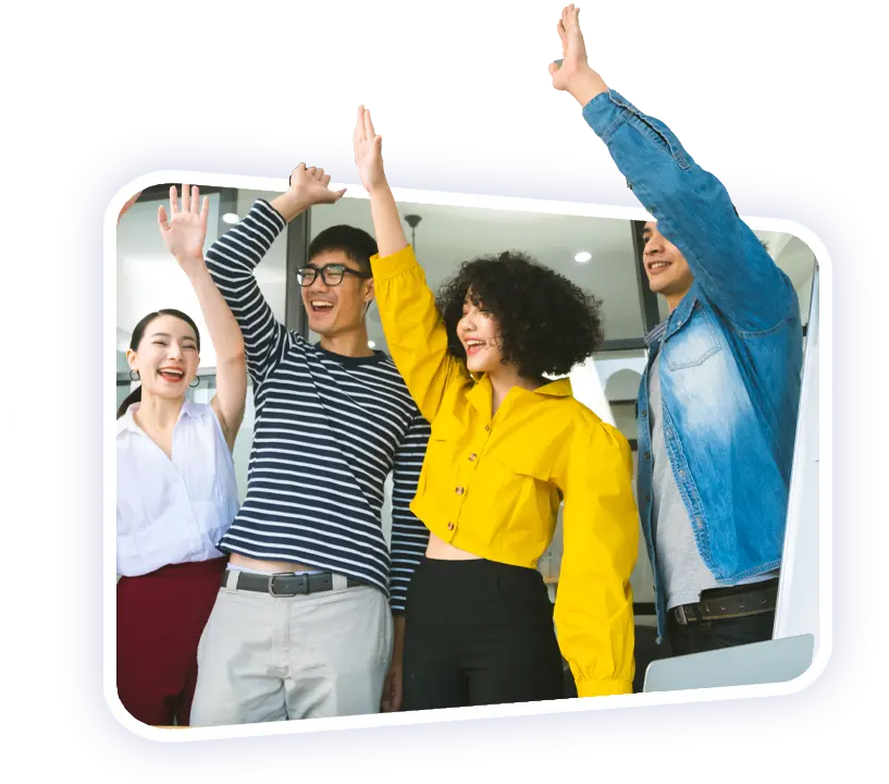 Disruptive Outsourcing Solutions a small team of young professionals celebrating another successful milestone