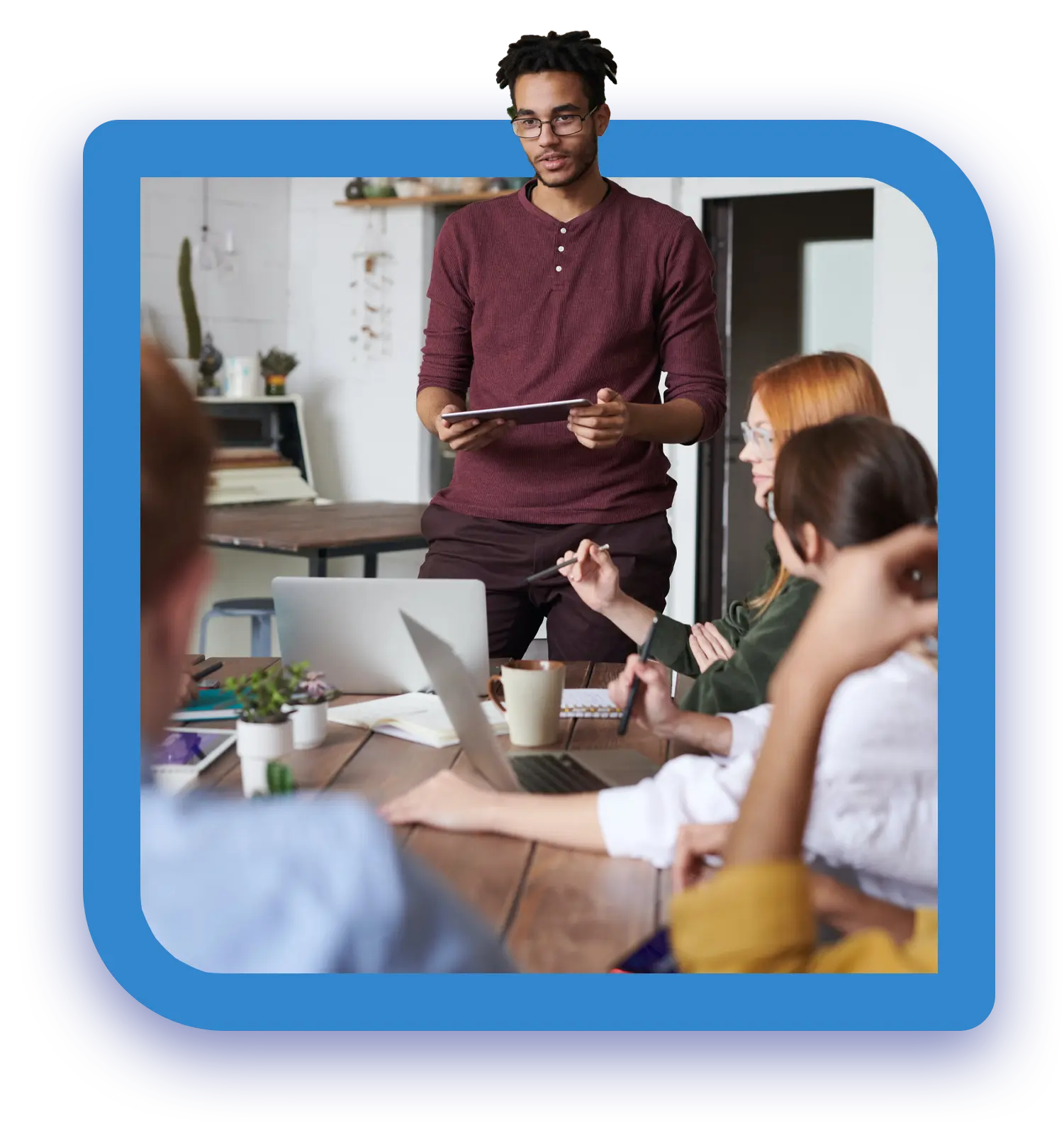 The TGS Network a small team of young professionals brainstorming on sustainable programs