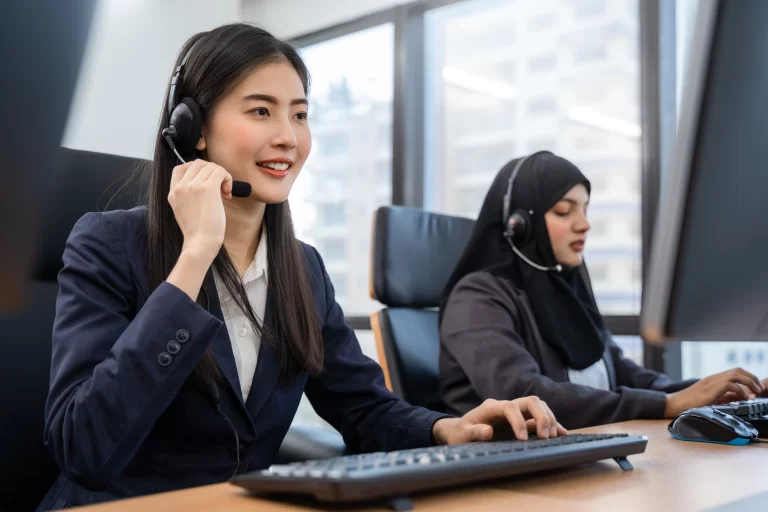hiring-overseas-freelancers-asian-woman-call-center-operator-talking-with-customer