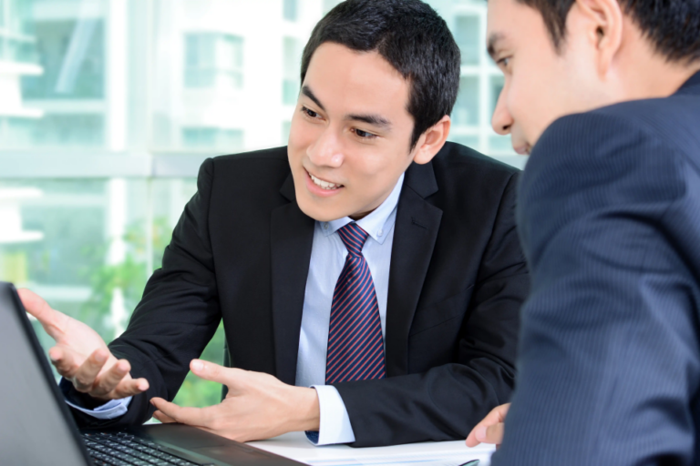 A consultant reviewing digital transformation plans as part of reinventing professional services firms.